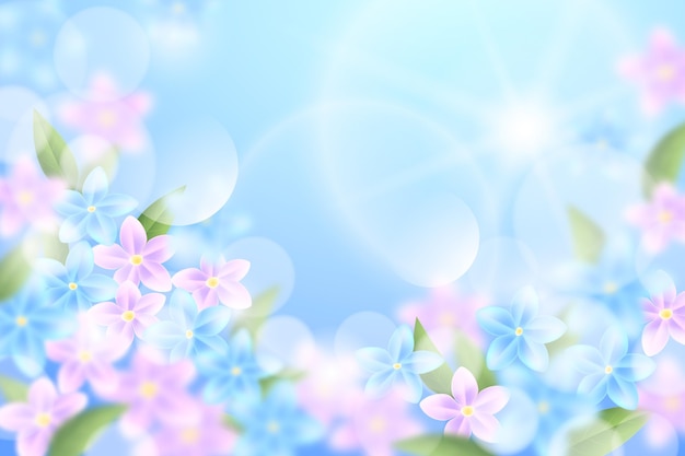 Vettore gratuito cielo e fiori rosa realistici sfondo sfocato primavera