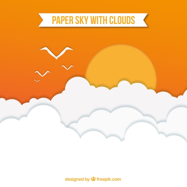 紙のテクスチャの太陽の背景と雲と空