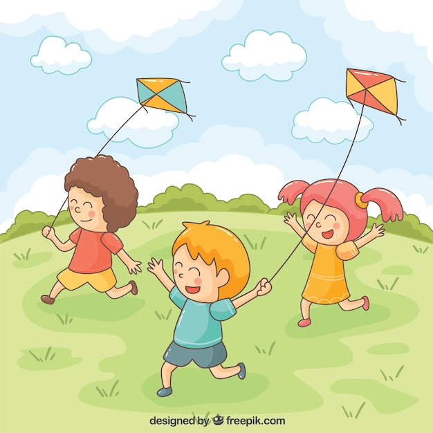 Smiling children playing with kites