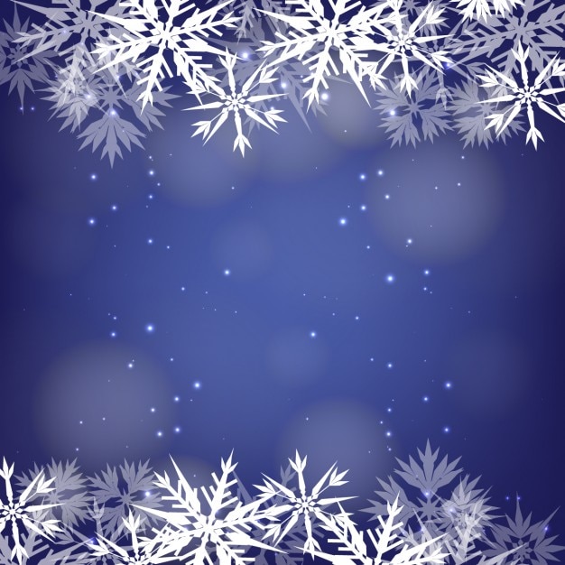 Snowflakes frame on a bokeh blue background