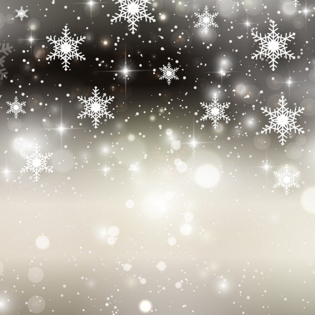 Snowflakes on a silver shiny bokeh background