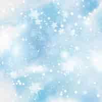 Vettore gratuito fiocchi di neve e stelle su sfondo acquerello