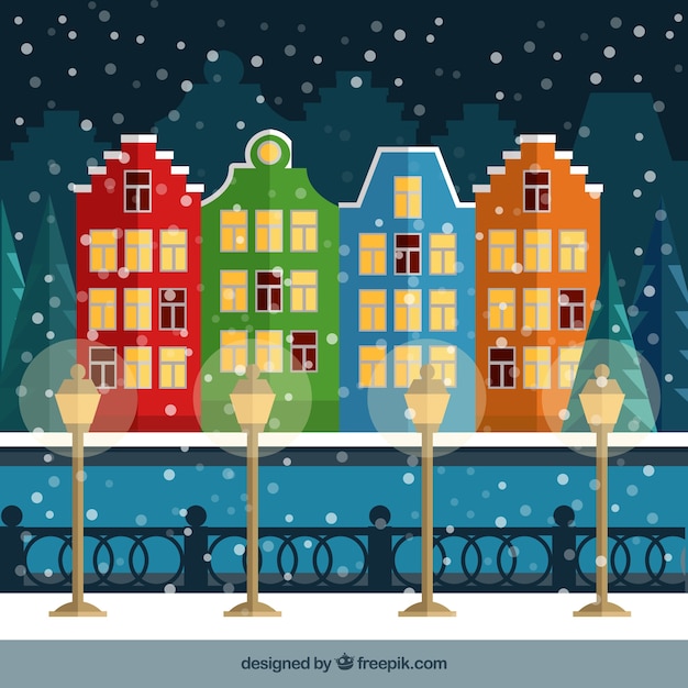 Free vector snowy city with colour houses illustration