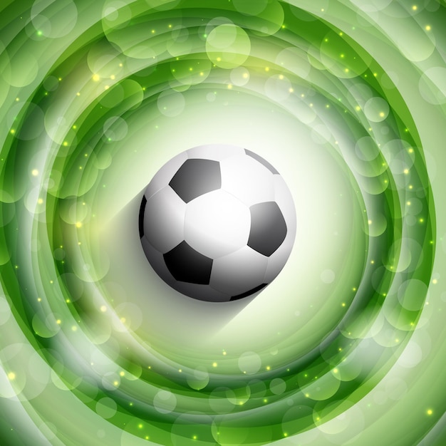 Free vector soccer or football on a green abstract background