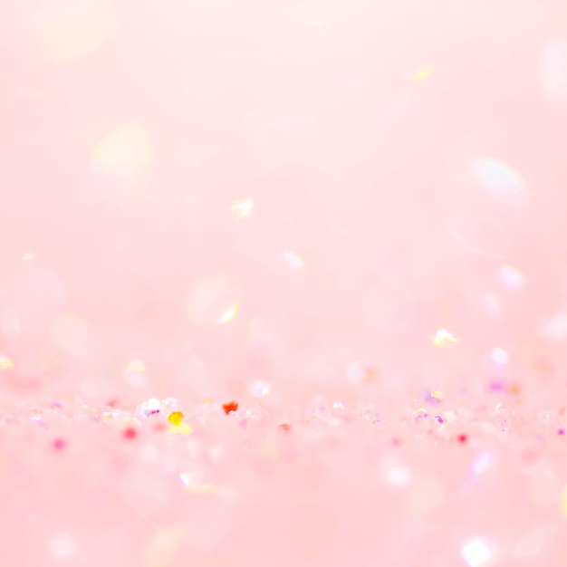 Soft pink glitter confetti bokeh background