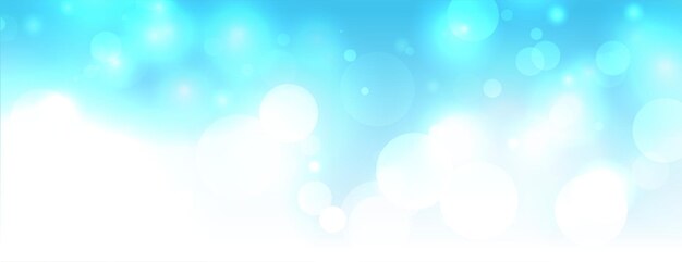 Sparkling bokeh lights on sky color blue background