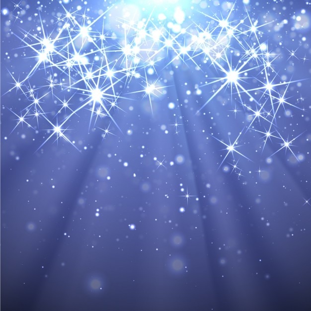 Free vector sparkling stars on a blue background