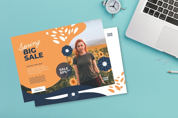 Spring sale flyer mock-up on blue background