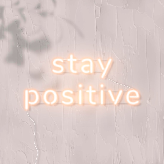 Free vector stay positive neon word
