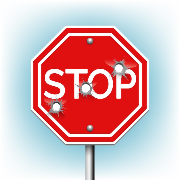 Stop sign with bullet holes. Warning and danger, bullethole and aperture, perforation roadsign