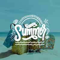 Free vector summer lettering with beach and bags