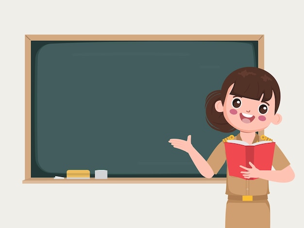 Teacher in classroom pointing to chalkboard