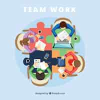 Free vector teamwork concept with jigsaw desk