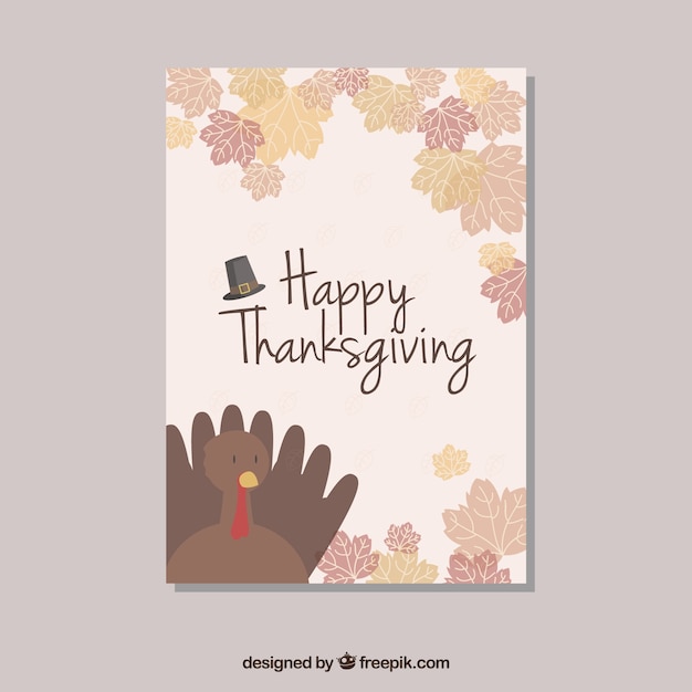 Free vector thanksgiving card with turkey and dry leaves