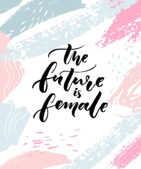 Будущее за женским. слоган вдохновляющего феминизма для плакатов и открыток. современная каллиграфия на художественном фоне мазками.