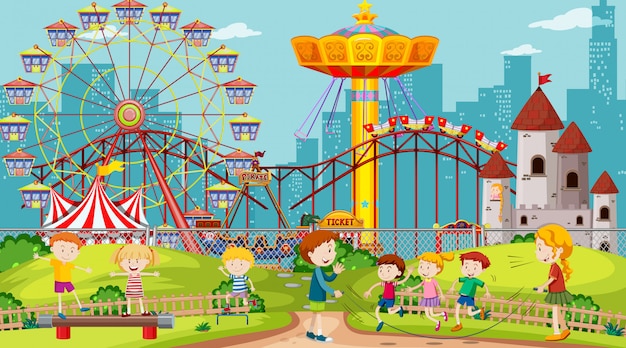 Free vector themepark scene with many rides and happy children