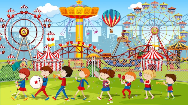 Free vector themepark scene with many rides with children in the band