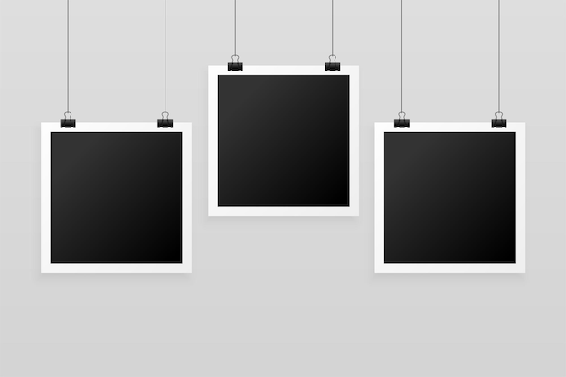 Free vector three hanging photo frames background