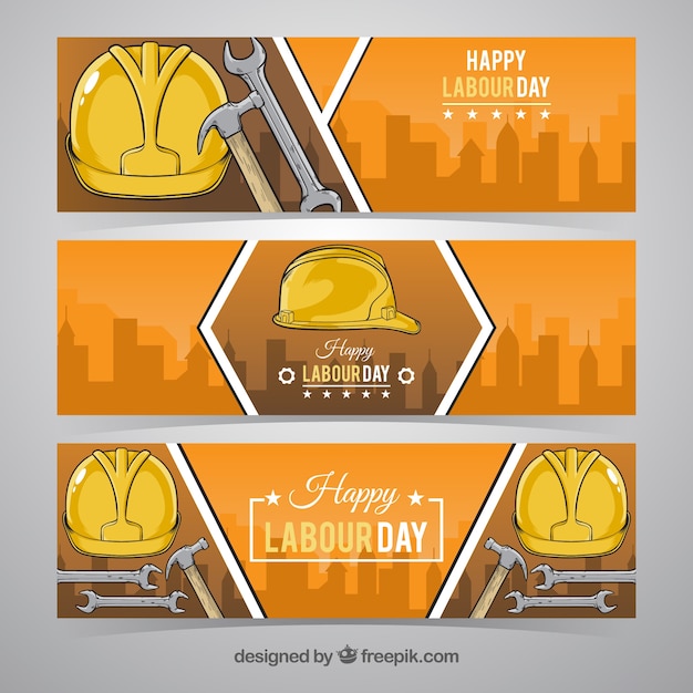Free vector three yellow helmet labour day banners