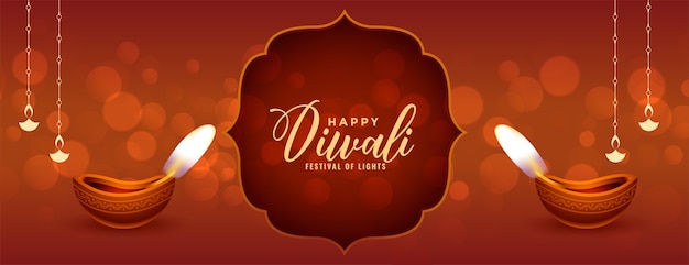 Vettore gratuito banner di diwali felice tradizionale con diya realistico