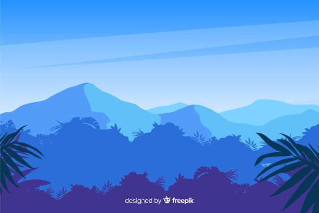 Tropical forest landscape with blue mountains
