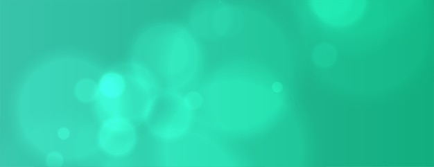 Free vector turquoise color bokeh banner with blur effect