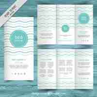 Vettore gratuito template turchese trifold affari