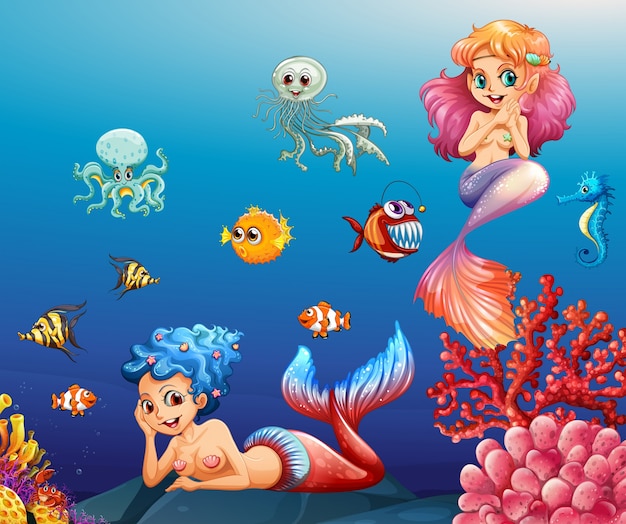 Две красивые русалки и морских животных под водой