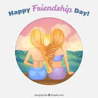 Free vector two friends on the beach for friendship day