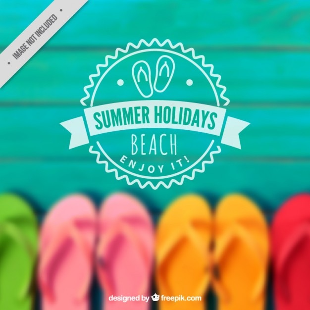 Unfocused summer background with colored flip flops