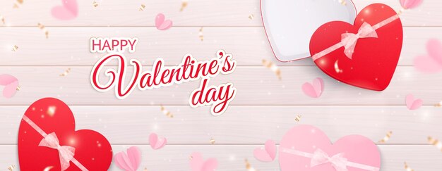 Valentines day hearts horizontal banner with ornate text and realistic heart shaped and gift boxes