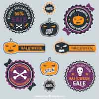 Vettore gratuito varietà di halloween di vendita distintivi
