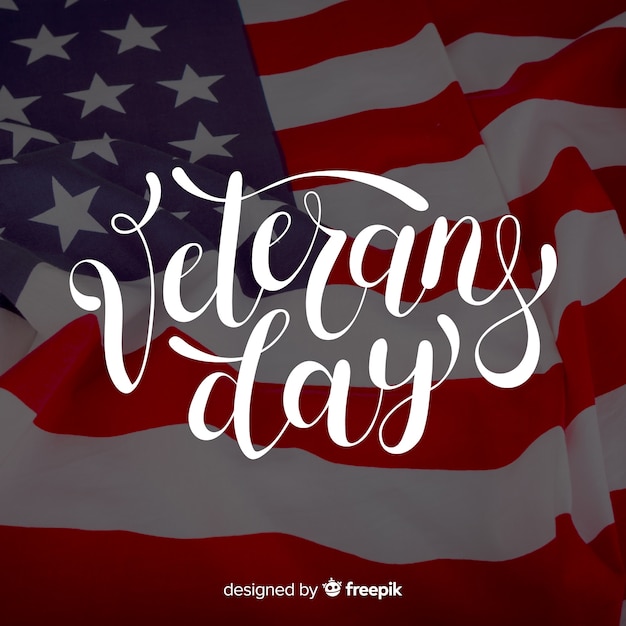 Free vector veterans day lettering with photo