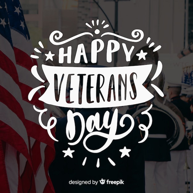 Veterans day lettering with stars and ribbons