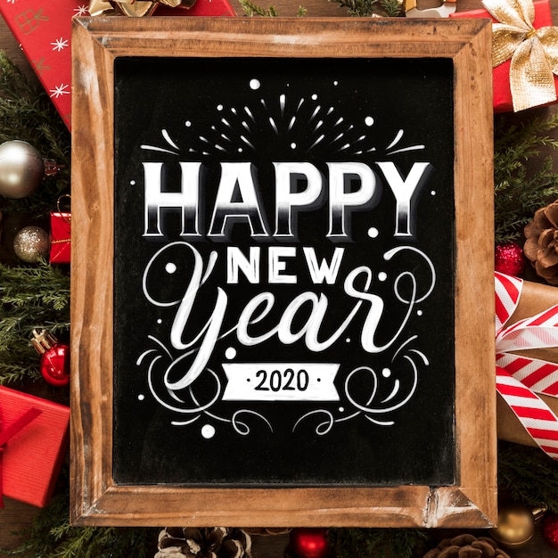 Vettore gratuito scritte d'epoca felice anno nuovo 2020