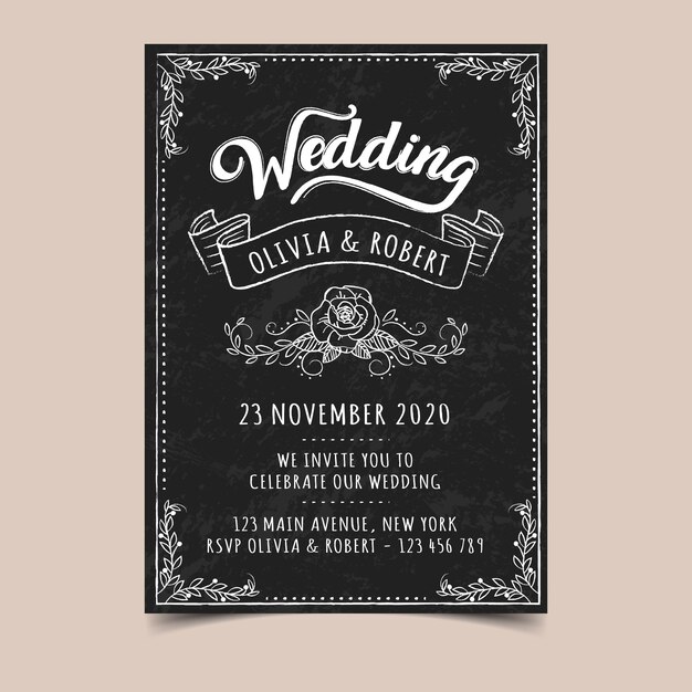 Vintage wedding invitation template on blackboard