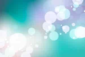 Free vector wallpaper with bokeh effect concept