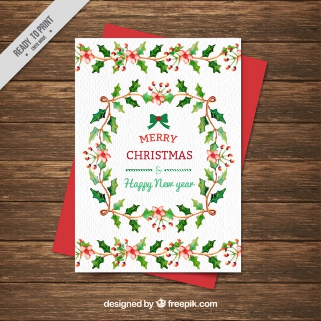 Free vector watercolor christmas card with floral elements