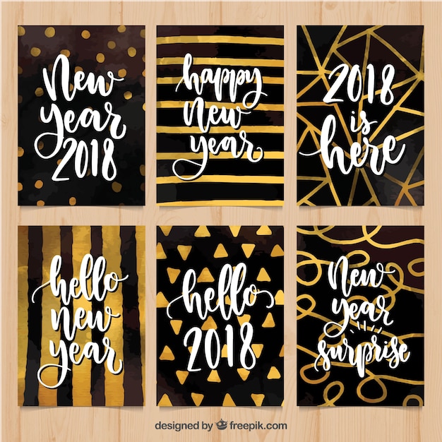 Watercolor new year 2018 cards in gold and black