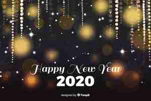 Free vector watercolour new year 2020 with golden sparkles