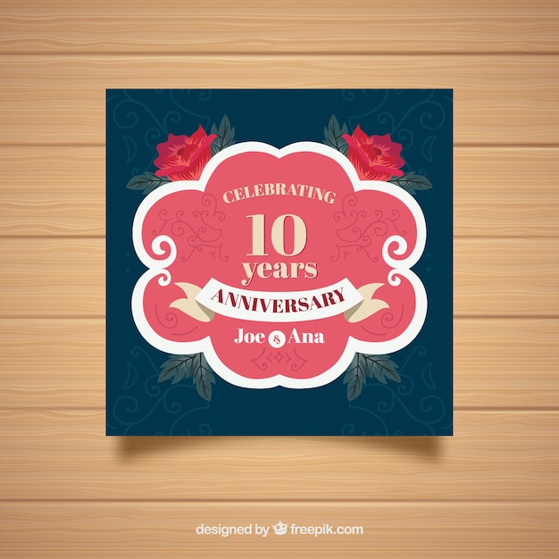 Free vector wedding anniversaty card with flowers