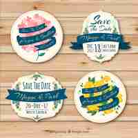 Free vector wedding badges with lovely flowers