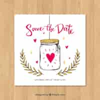 Free vector wedding card with hand drawn jar and hearts