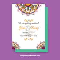 Free vector wedding card with hand drawn mandalas