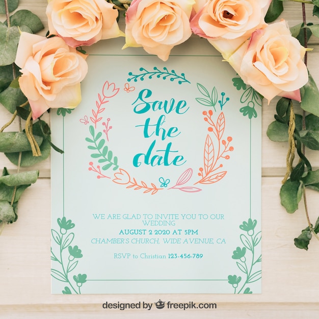 Wedding invitation with hand drawn floral wreath