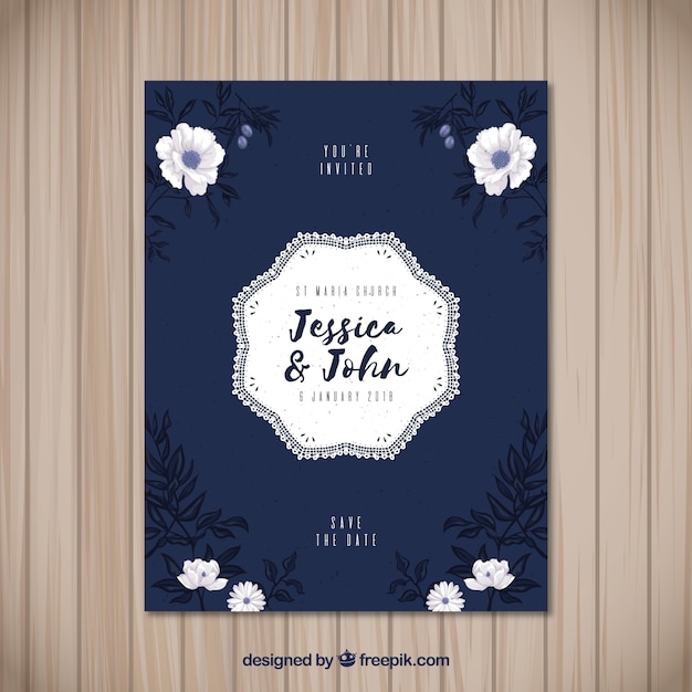 Free vector wedding invitation with hand drawn flowers