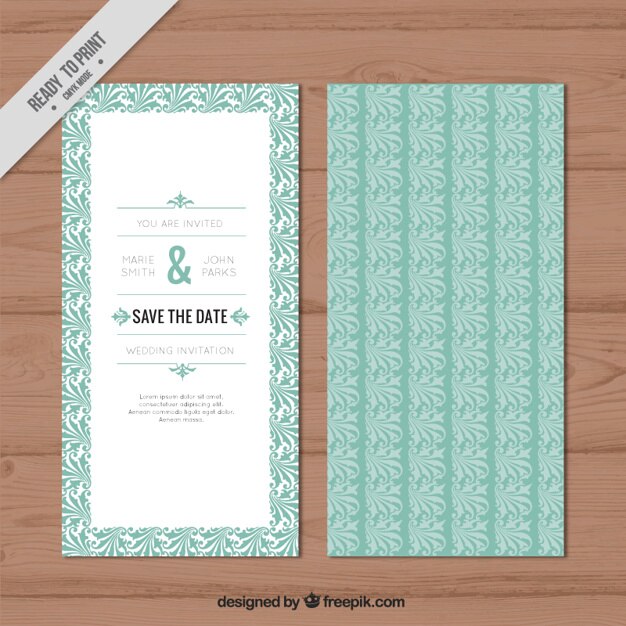 Free Vector wedding invitation with hand drawn leaves decoration