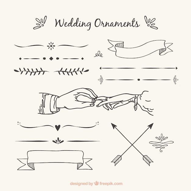 Free vector wedding ornaments with hand drawn style