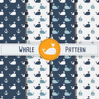 青い​背景​に​クジラ​の​シームレス​な​パターン