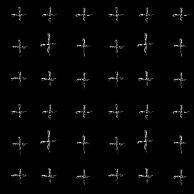 White chalk crosses on a black background